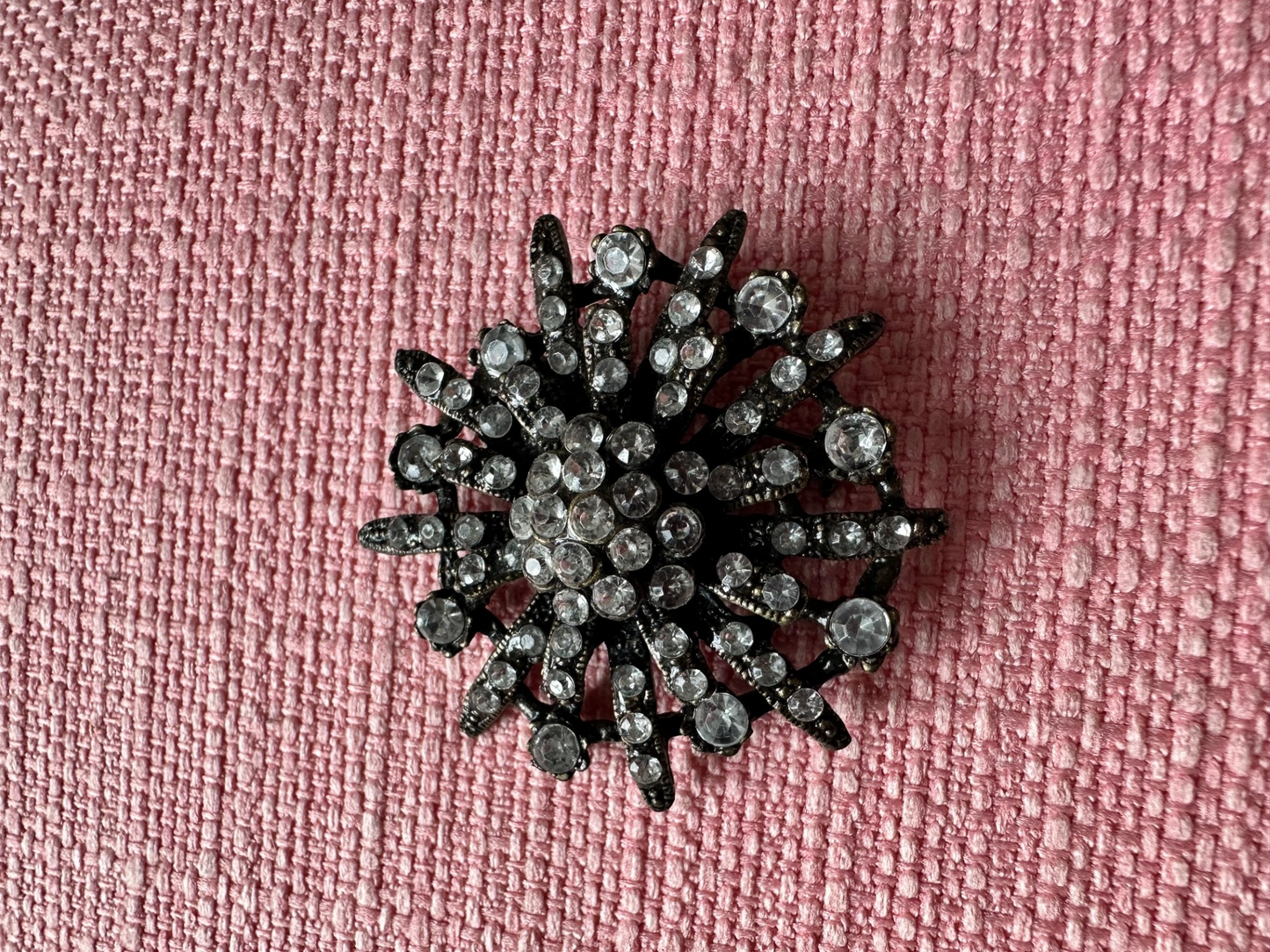 Vintage Bronze-Tone Starburst Brooch with Clear Rhinestones