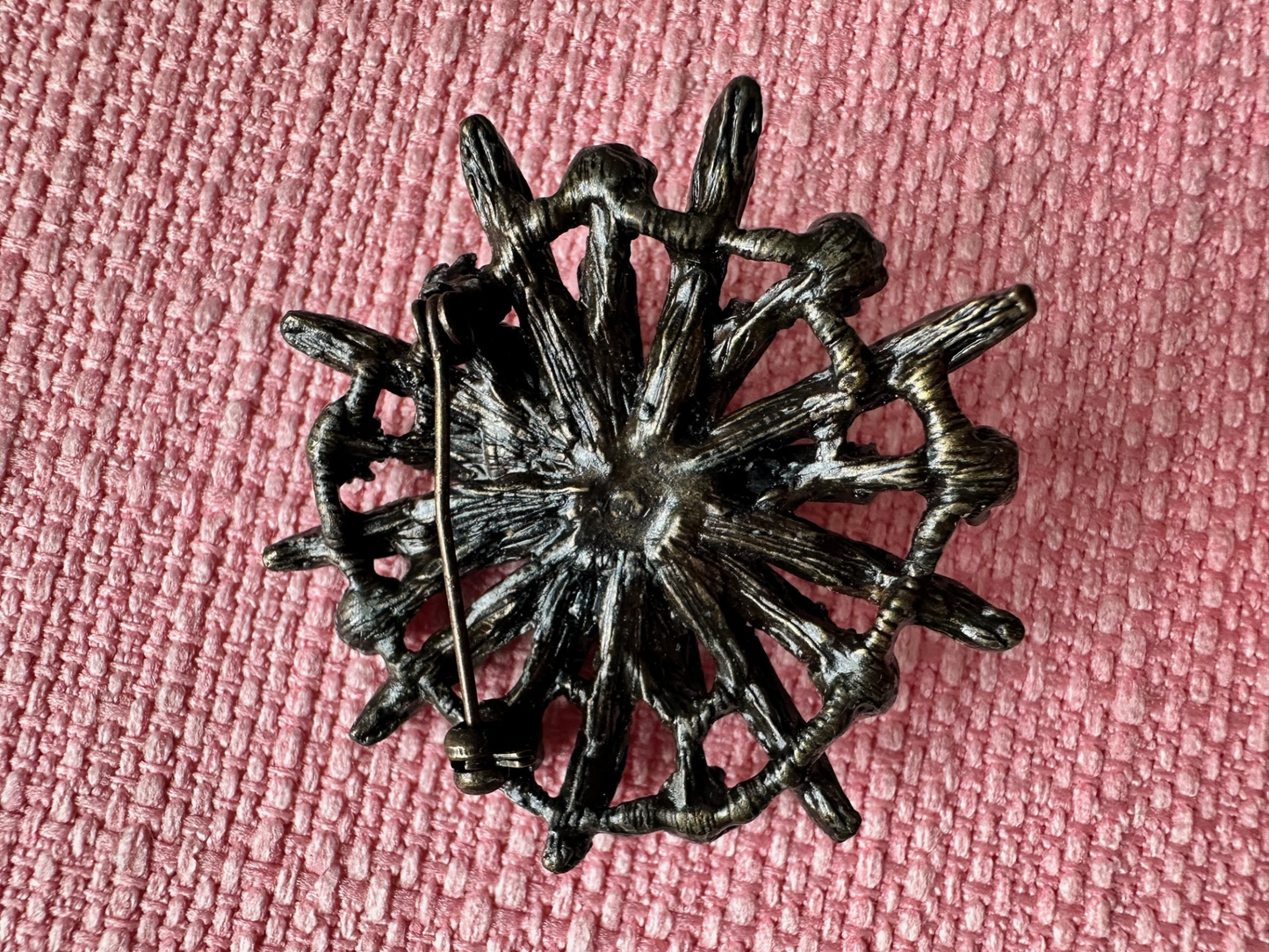 Vintage Bronze-Tone Starburst Brooch with Clear Rhinestones