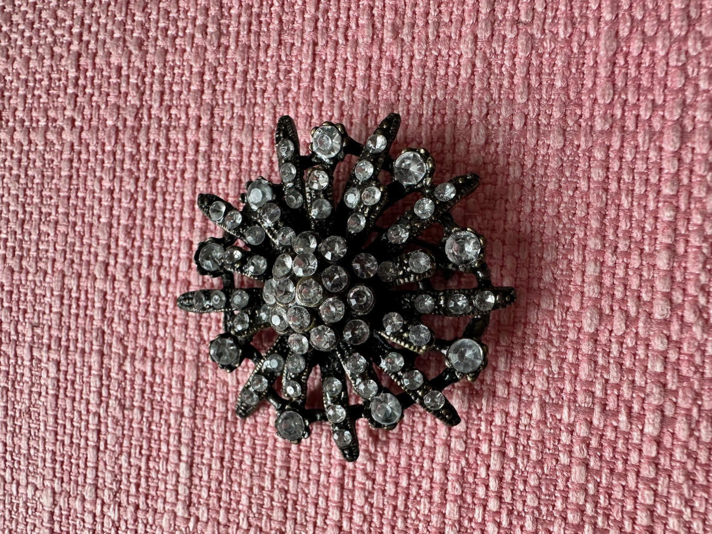 Vintage Bronze-Tone Starburst Brooch with Clear Rhinestones